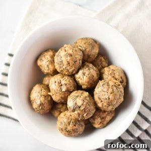 Sunflower Butter Energy Balls — Gluten- and Nut-Free Snacks 4 energy balls in a white bowl on a towel