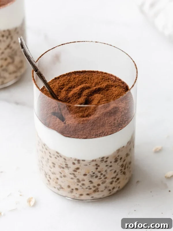 Banana Cream Pie Overnight Oats Recipe for Creamy Make-Ahead Breakfast 12 Tiramisu overnight oats in a cup topped with cocoa powder