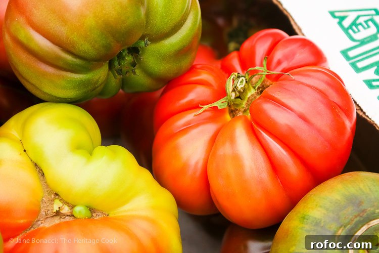 Refreshing Gluten-Free Summer Orzo Salad with Lemon and Herbs 3 Heirloom tomatoes at the farmer's market; Gluten Free Summer Orzo Pasta Salad © 2017 Jane Bonacci, The Heritage Cook