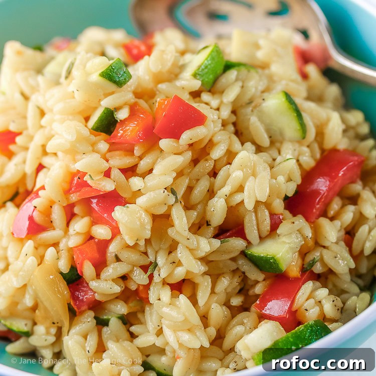 Refreshing Gluten-Free Summer Orzo Salad with Lemon and Herbs 6 Close up of a bowl; Gluten Free Summer Orzo Pasta Salad © 2017 Jane Bonacci, The Heritage Cook