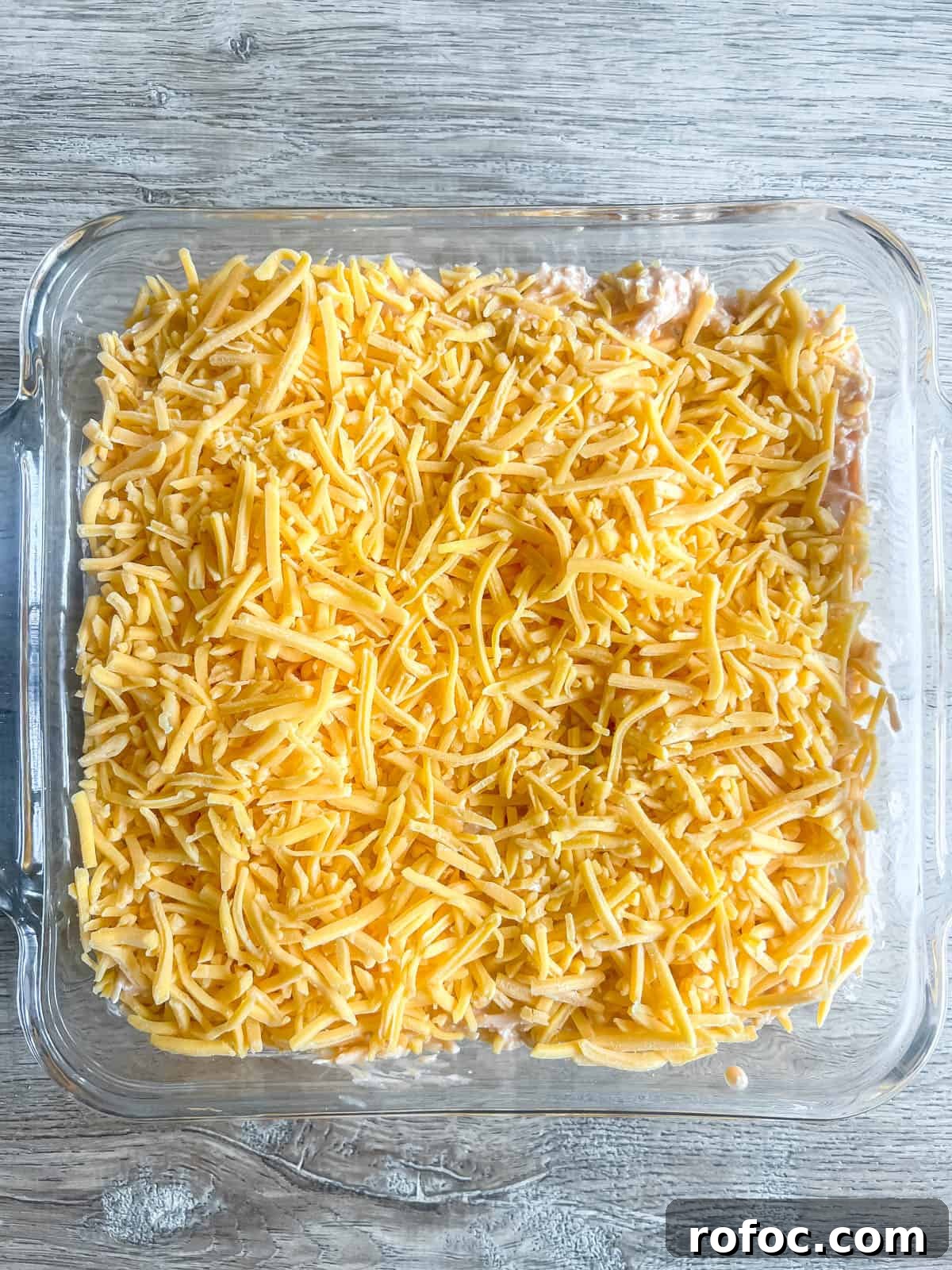 Creamy Buffalo Chicken Dip Made with Canned Chicken 8 Buffalo chicken dip before baking.