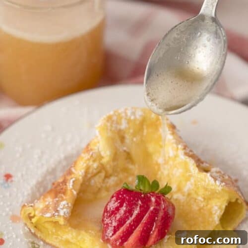Fluffy German Pancake (Dutch Baby) Recipe + Video Guide 7 German pancake with a buttermilk syrup drizzle