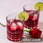 Cape Cod Cocktail with 2 Ingredients: Vodka & Cranberry Guide 2 Two cocktail glasses with a deep red cocktail.