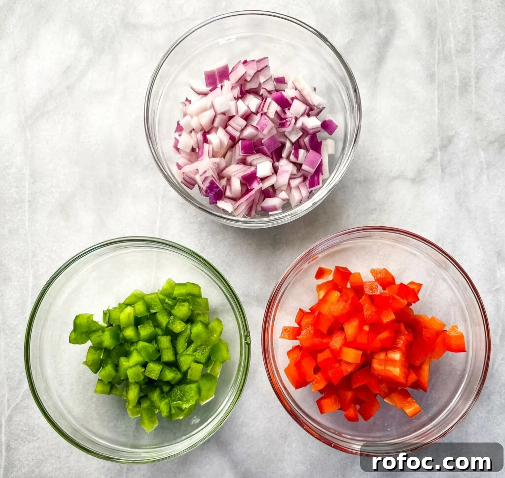 Shrimp & Crab Quiche Recipe with Creamy Cheese Filling 3 chopped onions, green peppers, and red onions in separate bowls