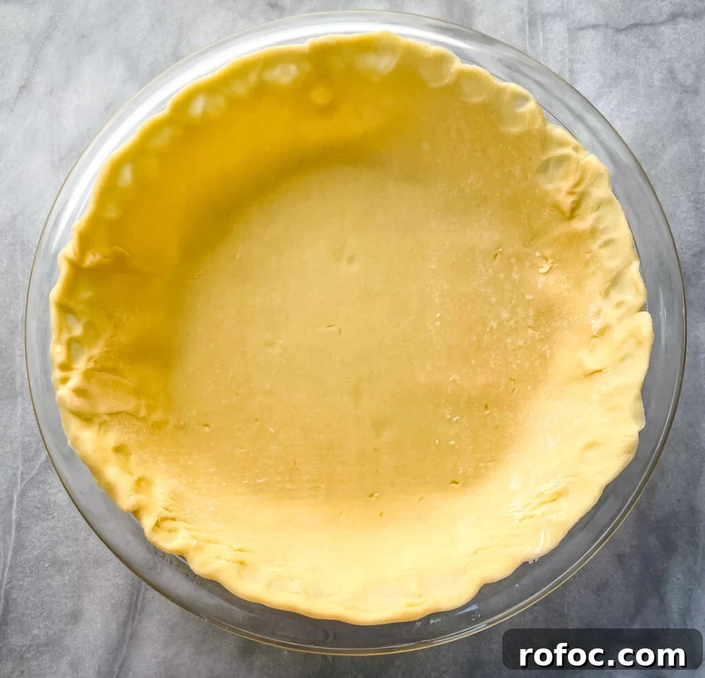 Shrimp & Crab Quiche Recipe with Creamy Cheese Filling 7 unbaked pie crust in a pie plate