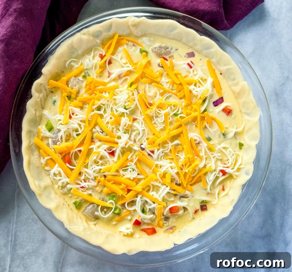 Shrimp & Crab Quiche Recipe with Creamy Cheese Filling 10 crab seafood quiche in a pie pan unbaked