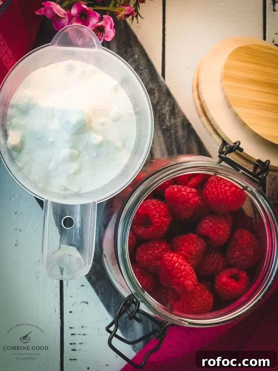 No-Cook Homemade Raspberry Syrup Recipe for Fresh, Intense Flavor 3 Ingredients for uncooked raspberry syrup - granulated sugar and fresh raspberries.