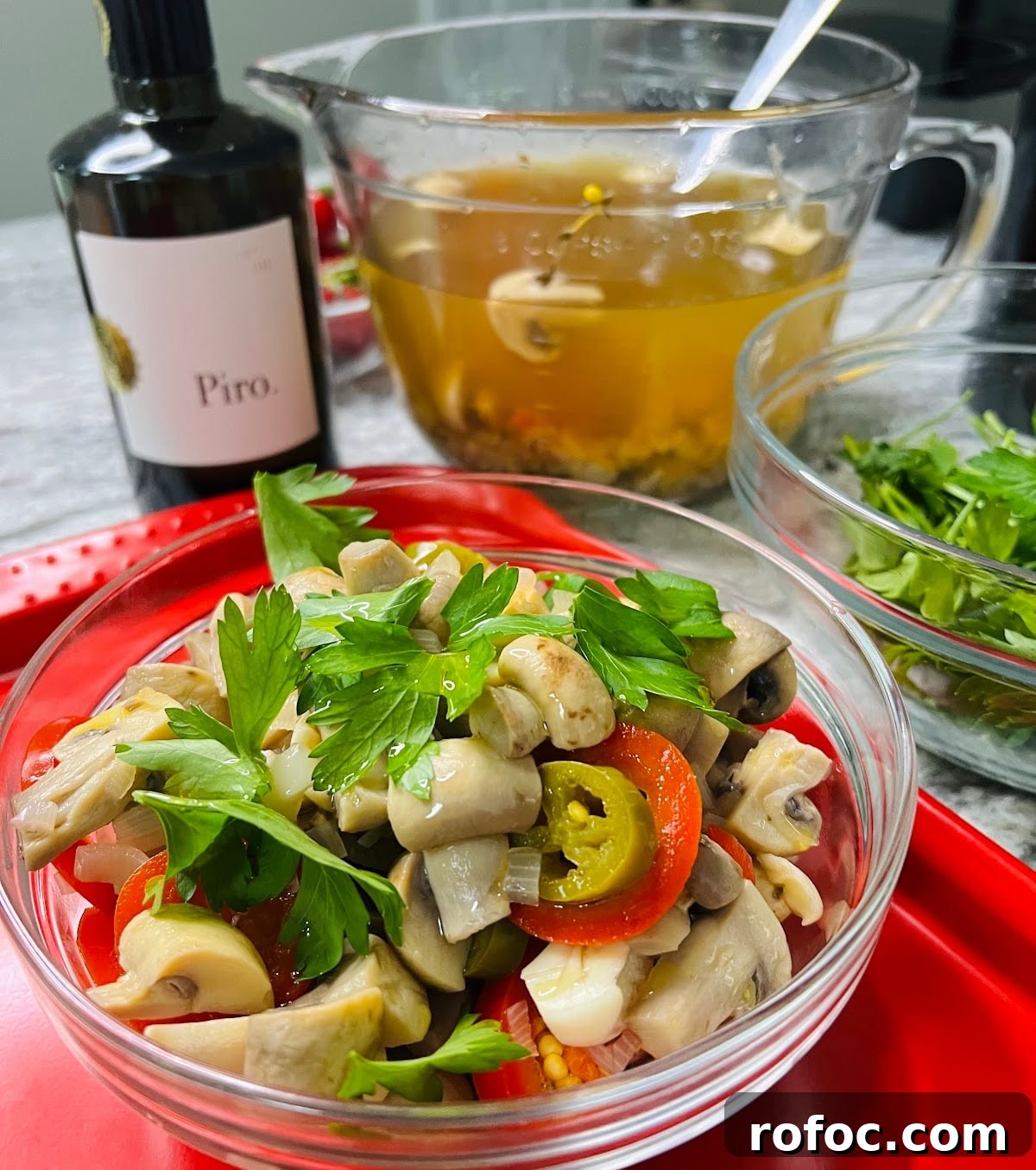 Spicy Marinated Italian Deli Mushrooms — Pickled Mushroom Recipe 17 Spicy Italian Marinated Mushrooms Finished and Styled in Jar with Bottle
