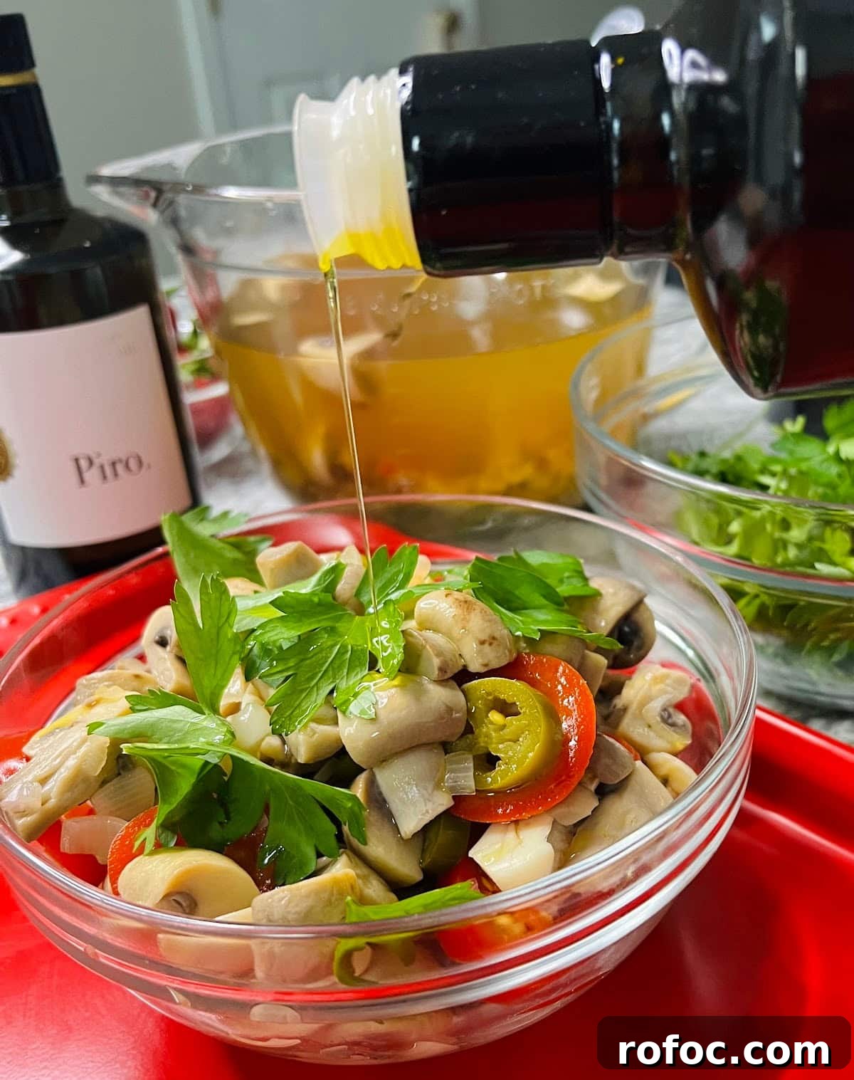Spicy Marinated Italian Deli Mushrooms — Pickled Mushroom Recipe 19 Spicy Italian Marinated Mushrooms Finished and Styled in Jar with Bottle