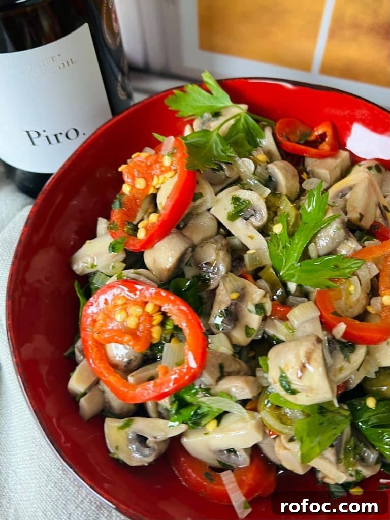 Spicy Marinated Italian Deli Mushrooms — Pickled Mushroom Recipe 3 Spicy Italian Pickled Mushrooms Finished and Styled in Bowl.