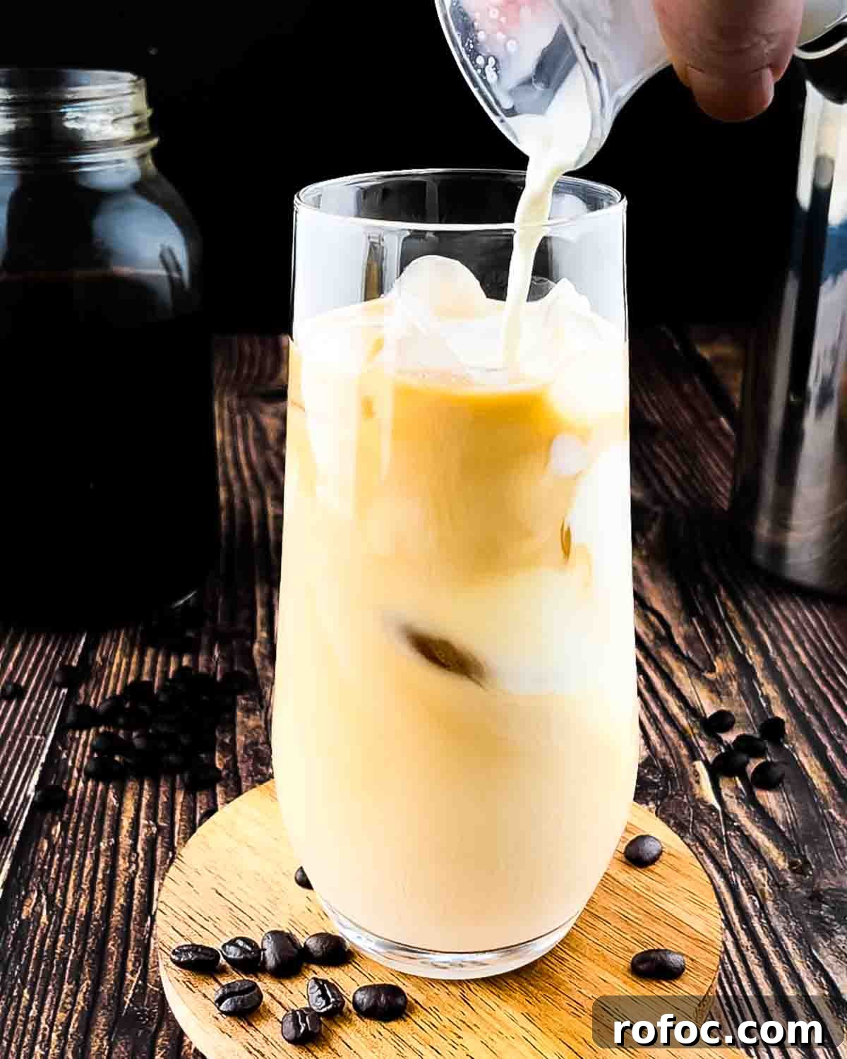 Homemade Vanilla Sweet Cream Cold Brew Recipe You’ll Love 11 The sweet cream being added to the glass of cold brew and ice.