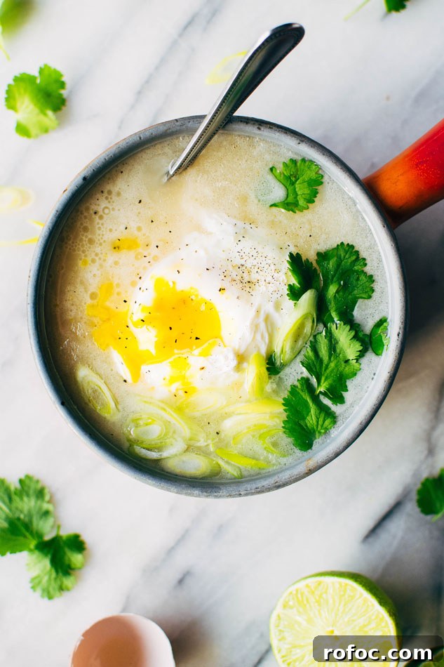 Sipping Broth with Poached Egg — Paleo, Dairy-Free & Vegan Option 4 Simple sipping broth with a poached egg! Your perfect go-to healthy pick-me-up // fridge clean out meal when you need a little extra something in your life. Made with high quality broth, fresh herbs, coconut milk and a poached egg this little pot is gauranteed to having you feeling fine in no time!