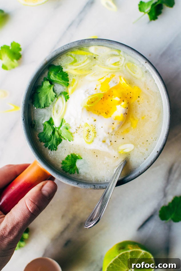 Sipping Broth with Poached Egg — Paleo, Dairy-Free & Vegan Option 7 Simple sipping broth with a poached egg! Your perfect go-to healthy pick-me-up // fridge clean out meal when you need a little extra something in your life. Made with high quality broth, fresh herbs, coconut milk and a poached egg this little pot is gauranteed to having you feeling fine in no time!