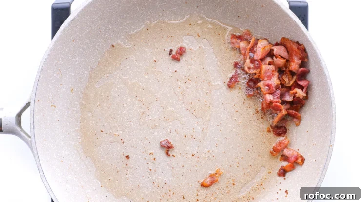 Warm German-Style Potato Salad Recipe for Authentic Flavor 3 cooking bacon in large skillet