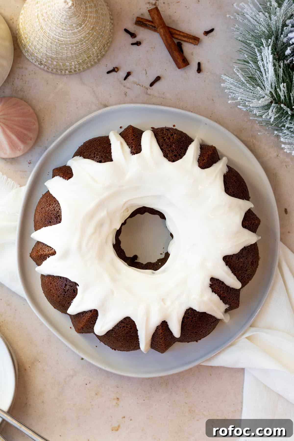Gingerbread Bundt Cake with Silky Cream Cheese Glaze 4 overhead view of a gingerbread bundt cake with cream cheese glaze