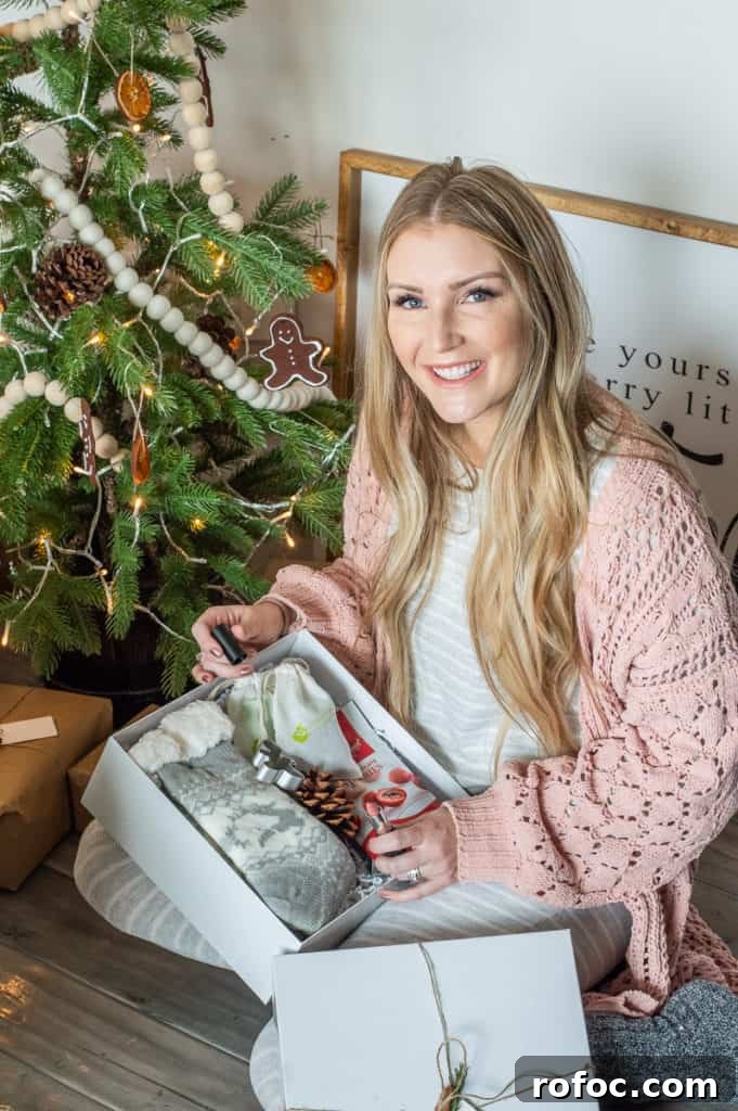 How to Create a Cozy Hygge Christmas Atmosphere 2 Girl next to a christmas tree with Hygge christmas gift basket