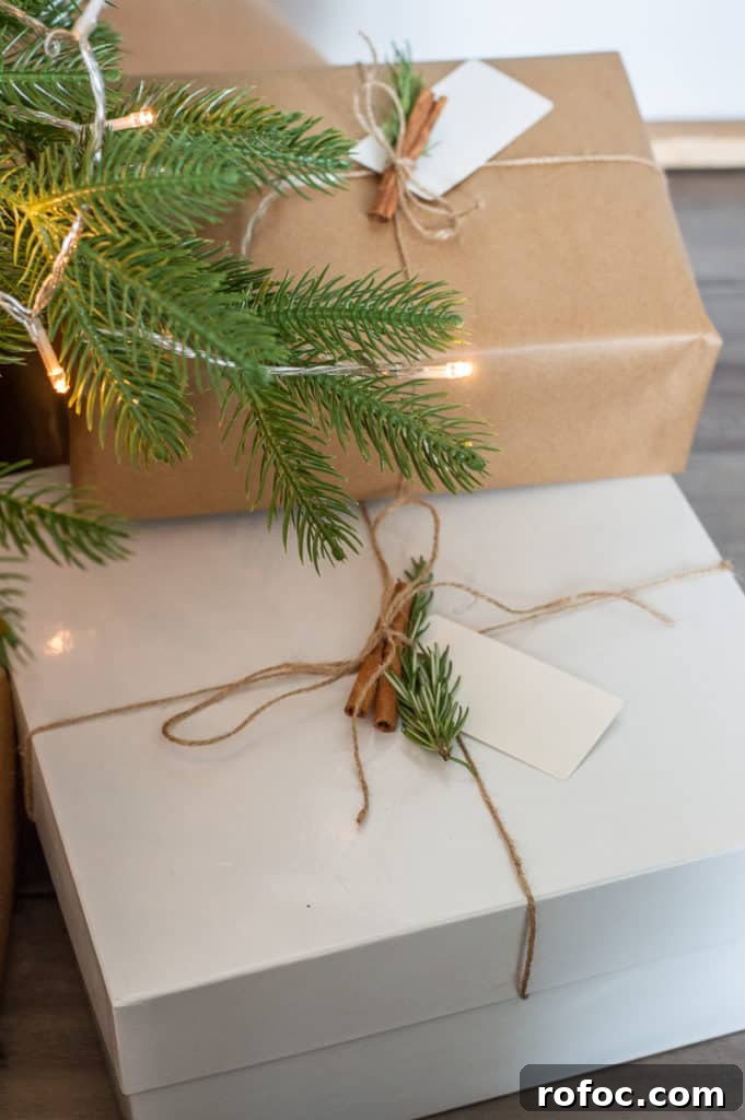 How to Create a Cozy Hygge Christmas Atmosphere 15 DIY Kraft paper wrapped christmas presents with cinnamon, twine and rosemary