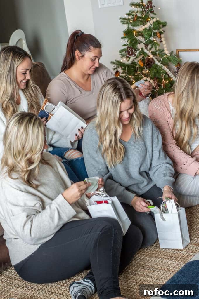 How to Create a Cozy Hygge Christmas Atmosphere 3 Girls opening up Hygge christmas presents