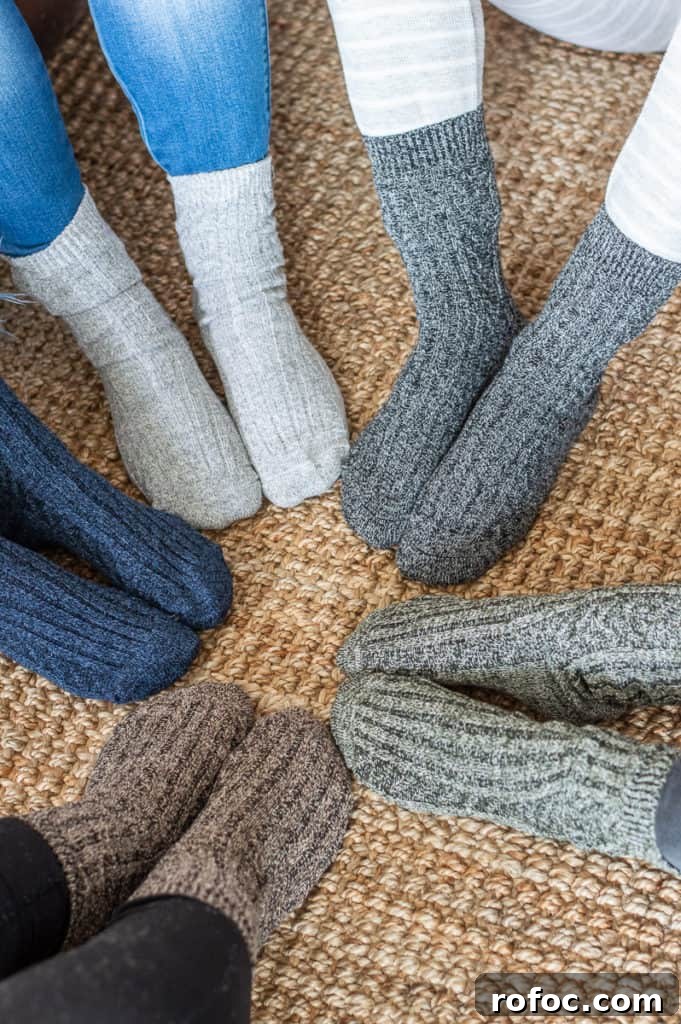 How to Create a Cozy Hygge Christmas Atmosphere 4 Girls with feet in a circle with cozy christmas socks