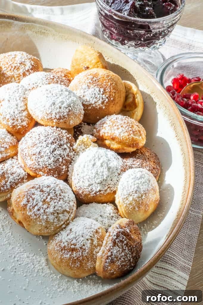 How to Create a Cozy Hygge Christmas Atmosphere 5 Ebelskiver recipe with powdered sugar on top in a bowl