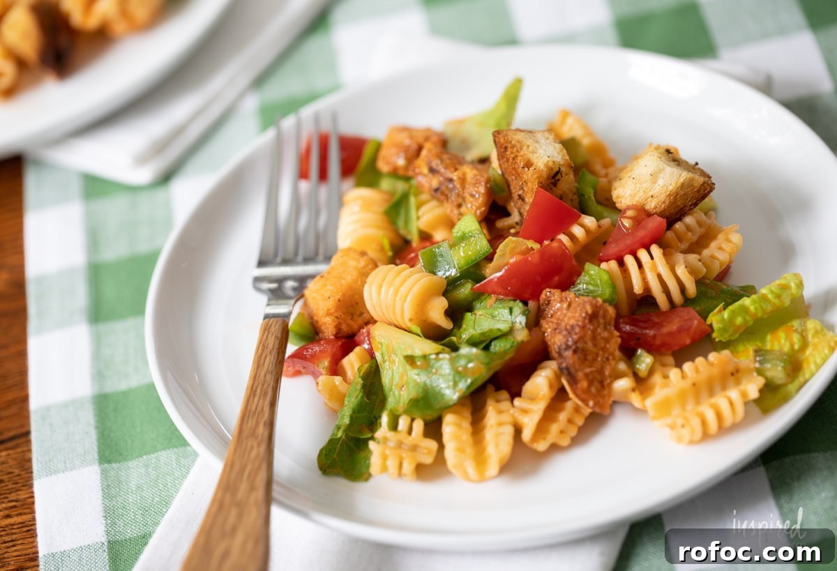 Radiatori Pasta Salad with Fresh Herbs and Lemon Vinaigrette 4 Radiatori Salad on plate.