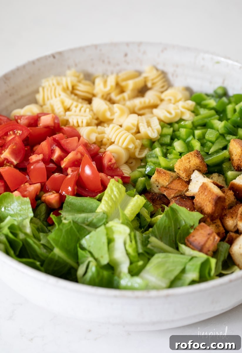 Radiatori Pasta Salad with Fresh Herbs and Lemon Vinaigrette 7 Radiatori Salad ingredients in bowl.