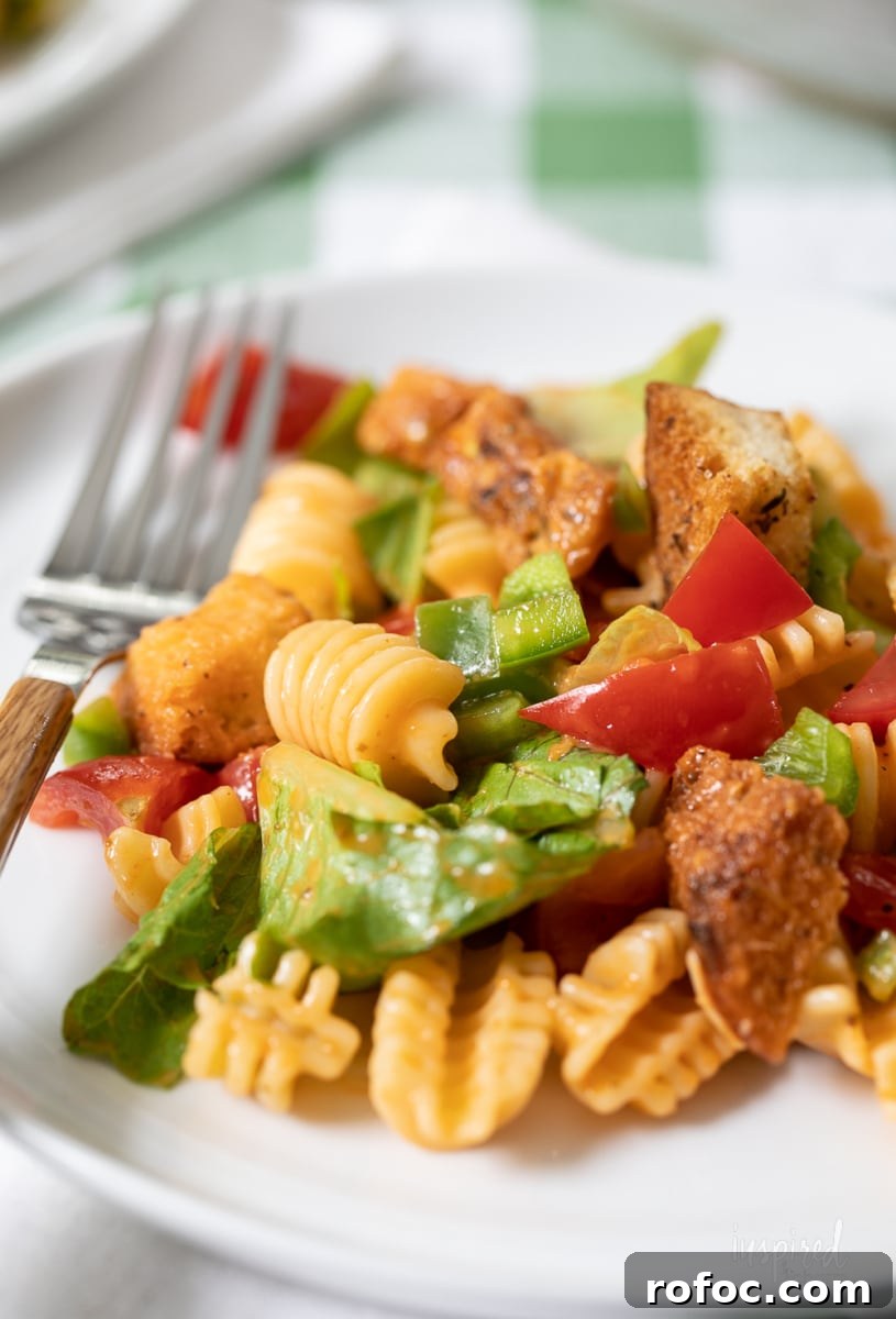 Radiatori Pasta Salad with Fresh Herbs and Lemon Vinaigrette 10 Radiatori Salad on a plate.