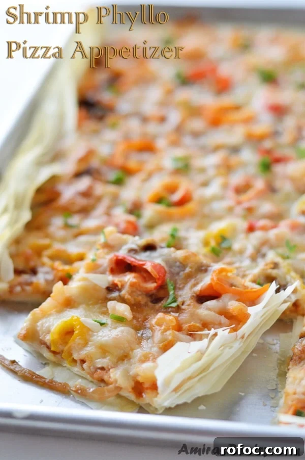 Game-Day Shrimp Phyllo Pizza Bites: Crispy Appetizer Recipe 2 A close up of a slice of pizza