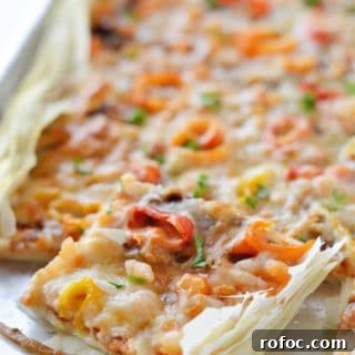 Game-Day Shrimp Phyllo Pizza Bites: Crispy Appetizer Recipe 9 A close up of a slice of pizza