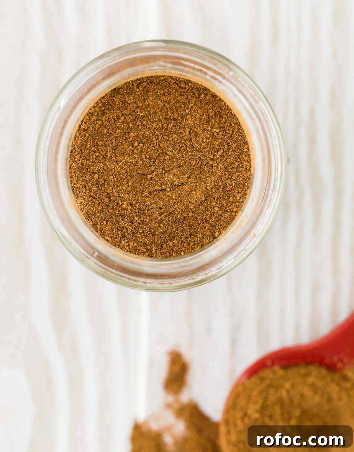 Homemade Apple Pie Spice Mix You Can Make in Minutes 4 Overhead view of apple pie spice mix in a jar.