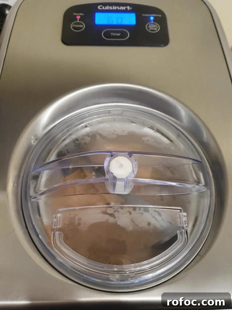 Creamy Milo Ice Cream Recipe: Homemade Milo Frozen Treat 9 churning ice cream in ice cream churner.