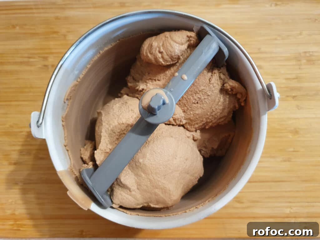 Creamy Milo Ice Cream Recipe: Homemade Milo Frozen Treat 10 top down view of churned milo ice cream in churning bowl.