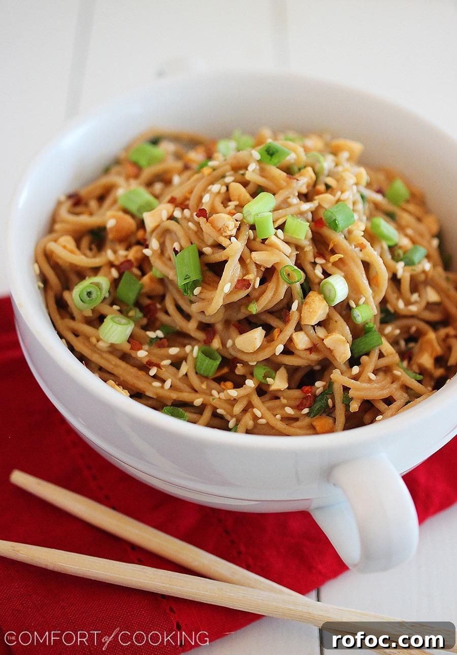 Asian Soy-Peanut Noodles with Sesame and Scallions 2 Simple Asian Soy-Peanut Noodles – These whole wheat noodles are a delicious twist on a takeout fave & only take 10 minutes! | thecomfortofcooking.com