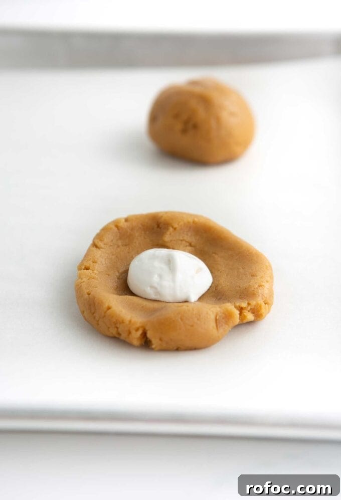 Chewy Fluffernutter Peanut Butter & Marshmallow Cookies 6 marshmallow creme in the center of peanut butter cookie dough