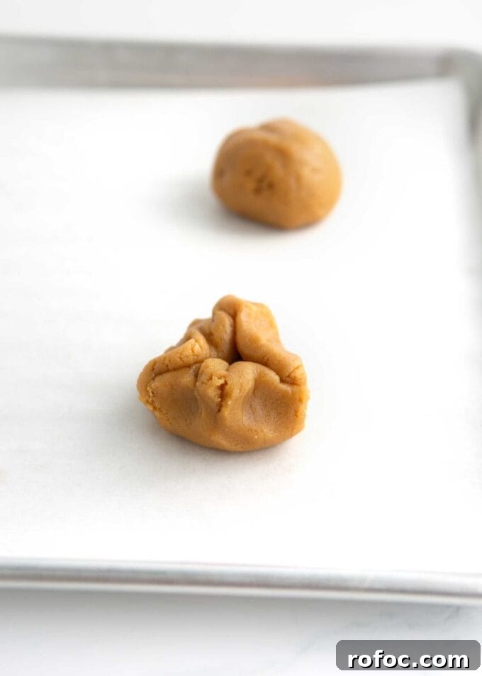 Chewy Fluffernutter Peanut Butter & Marshmallow Cookies 7 closing peanut butter over marshmallow creme