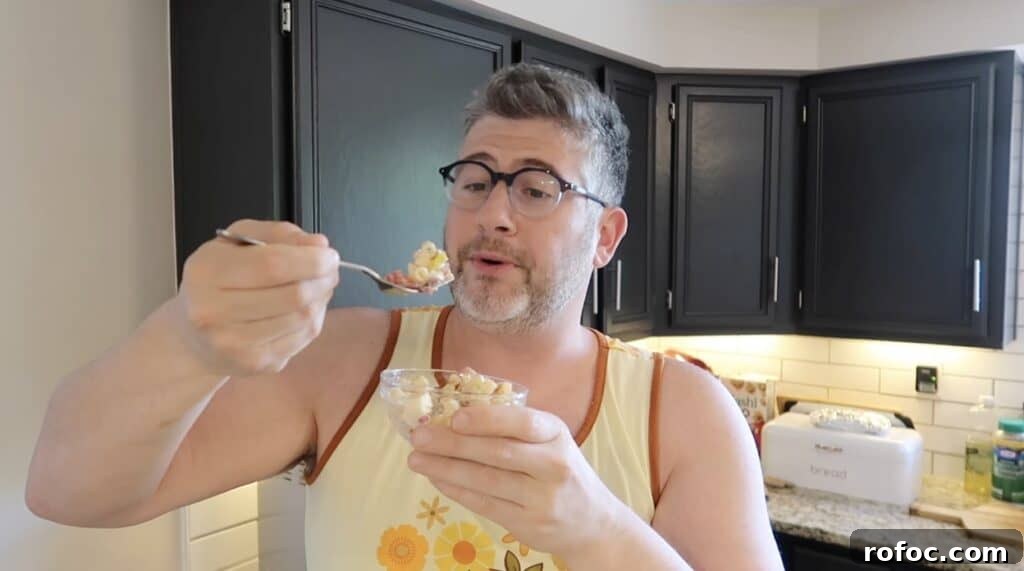 La Scala Pasta Salad Recipe: Classic Italian-Inspired Dish 14 Man with forkful of pasta