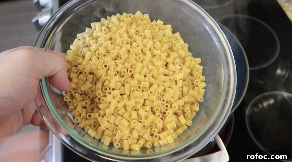 La Scala Pasta Salad Recipe: Classic Italian-Inspired Dish 5 Adding ditalini pasta to salted boiling water