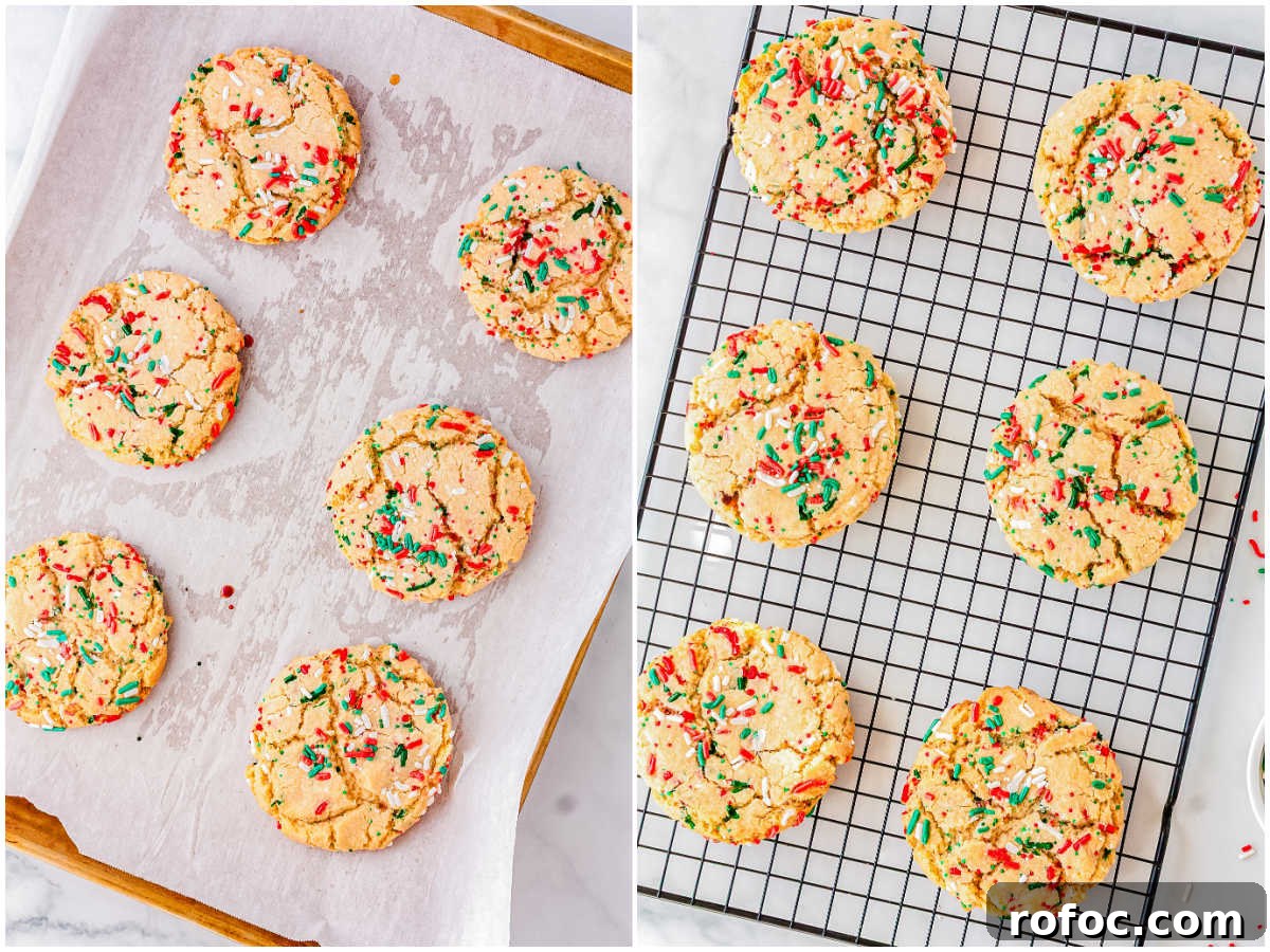 Freshly baked Christmas sprinkle sugar cookies cooling on parchment and wire racks, showing crisp edges and soft, chewy centers.