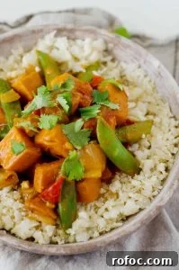 Vegetarian Red Curry Stir-Fry with Vegetables and Tofu 3 Vegetarian Red Curry Stir Fry in a Bowl Served and Ready