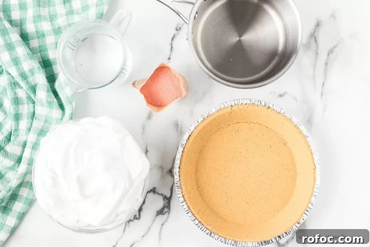Strawberry jello pie recipe is an easy and classic dessert you can make in minutes. Retro Strawberry jello pie recipe is so light and fluffy and you only need 5 ingredients! Strawberry jello pie cool whip recipe with no bake graham cracker crust makes Strawberry jello pie easy. #dessertonadime #strawberryjellopierecipe Ingredients needed - water, jello, cool whip and graham cracker crust