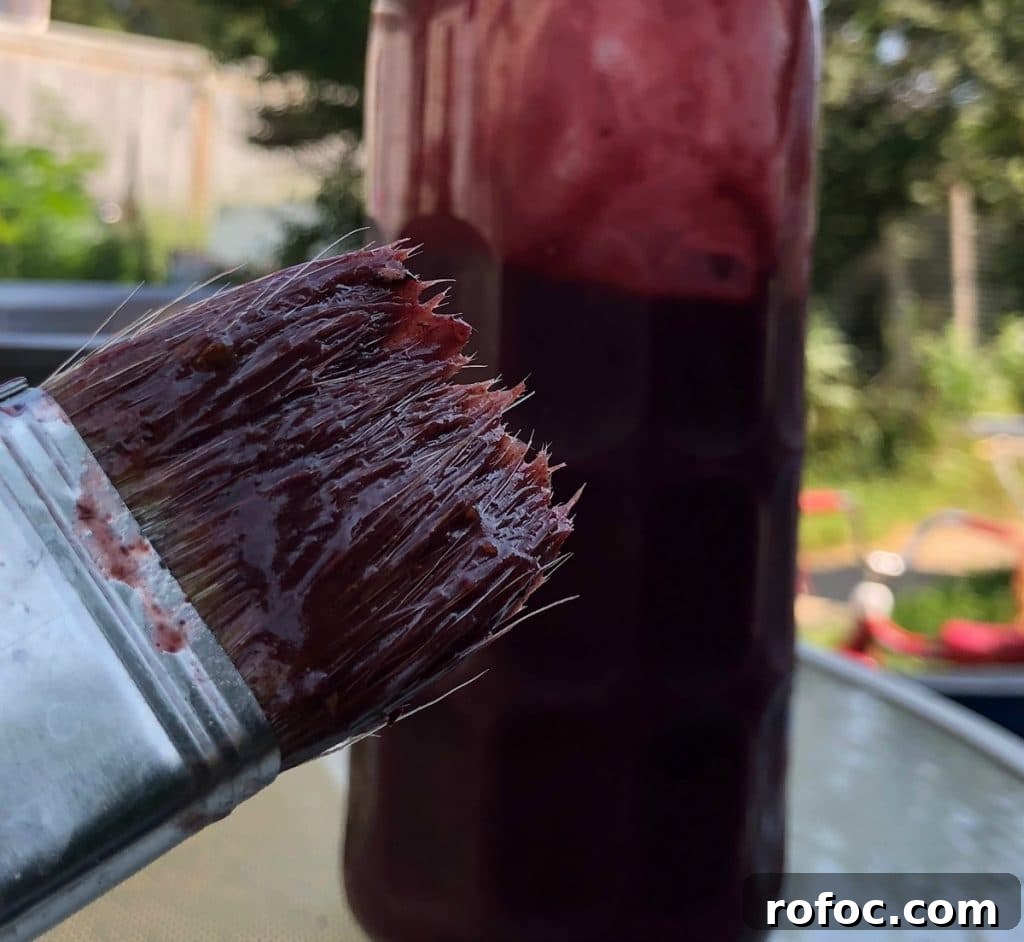 10 Delicious Saskatoon Berry Recipes You’ll Want to Try 23 Saskatoon Berry BBQ sauce bottle and BBQ brush