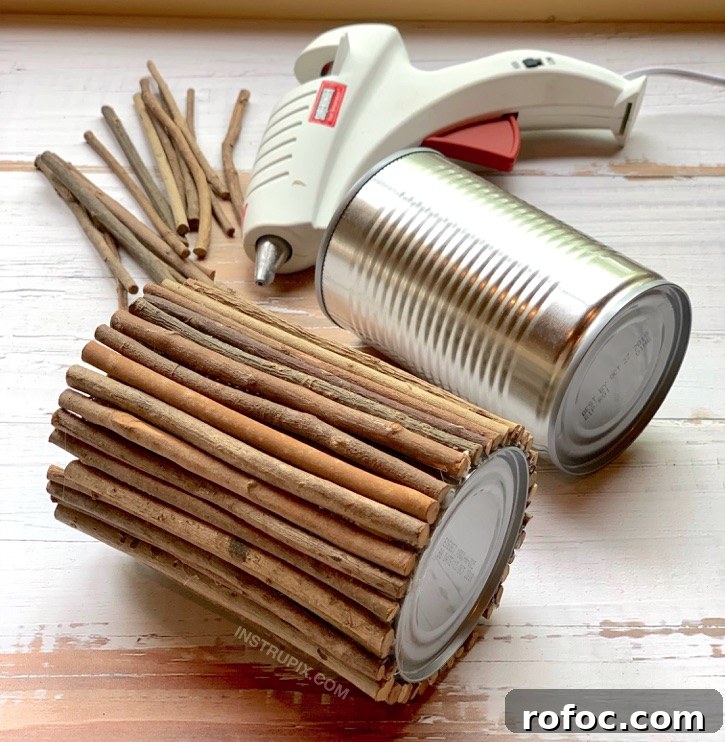 DIY Tin Can Makeover -- using sticks and hot glue! 6 Charming Ways To Dress Up A Tin Can