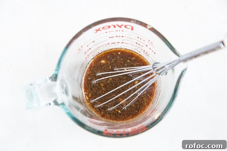 Instant Pot Vietnamese-Style Shredded Beef Recipe 5 ingredients for stir fry sauce in a measuring cup