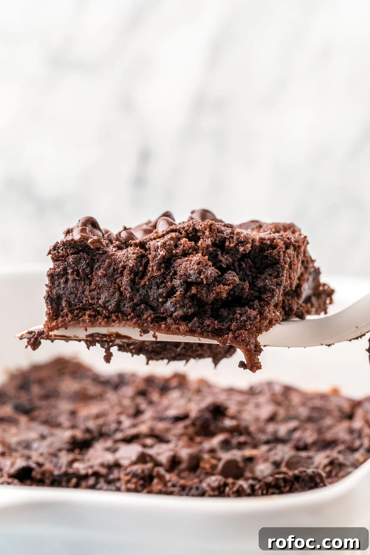 Decadent Chocolate Dump Cake Recipe for Quick Desserts 7 warm dessert with melted chocolate chips