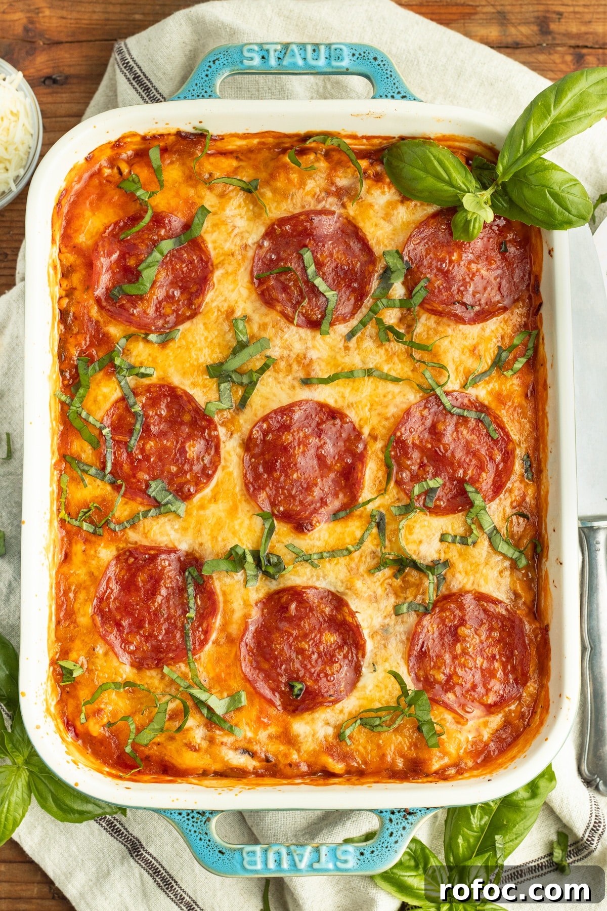 This is a picture of a baking dish with cooked spaghetti squash pizza casseole. 
