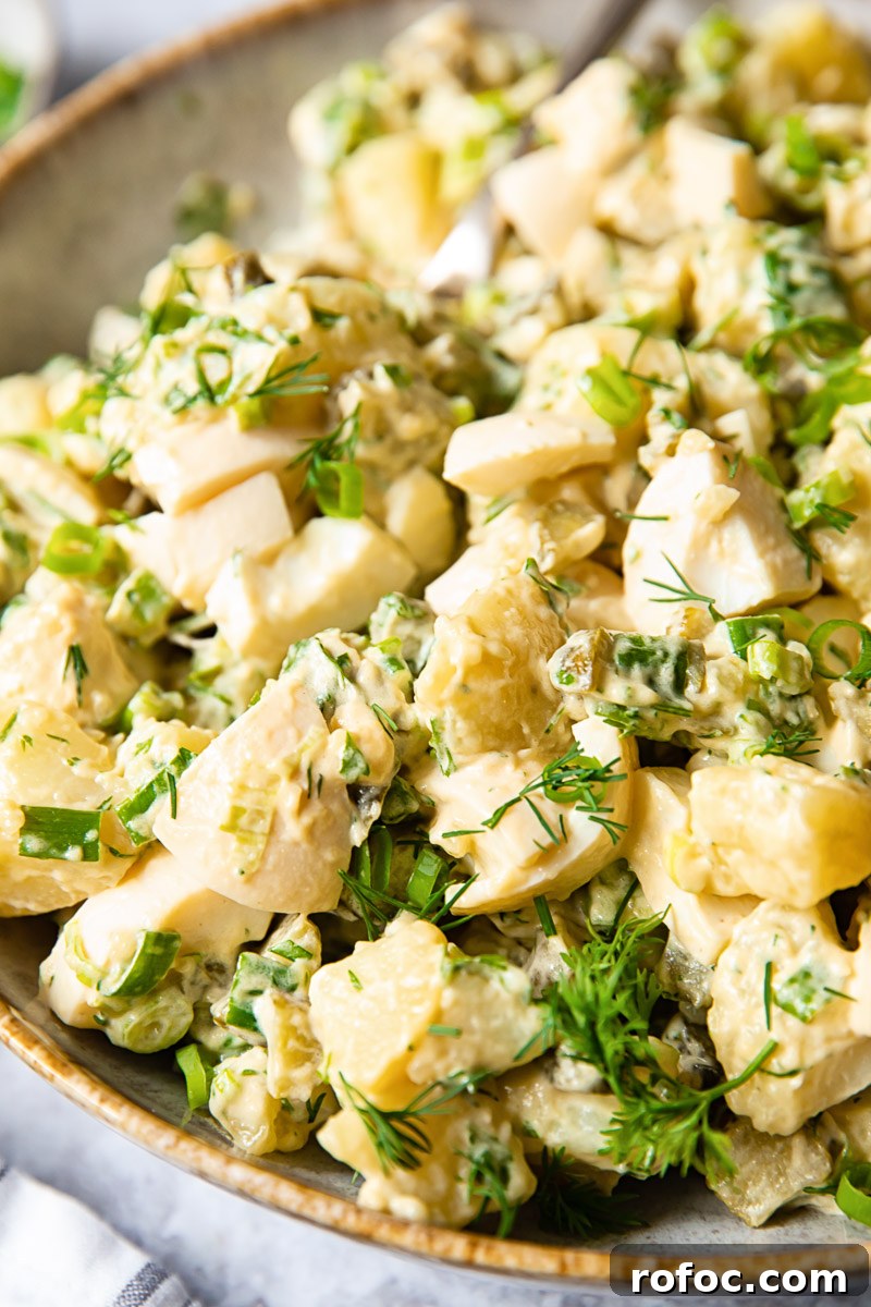 Creamy Dill Potato Salad with Fresh Herbs and Lemon Zest 6 side view of dill potato salad
