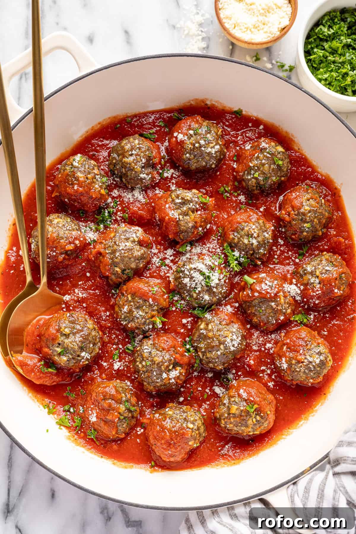 Authentic Italian Meatballs Recipe Ready in 30 Minutes 11 Large white pan filled with homemade Italian meatballs in marinara sauce.
