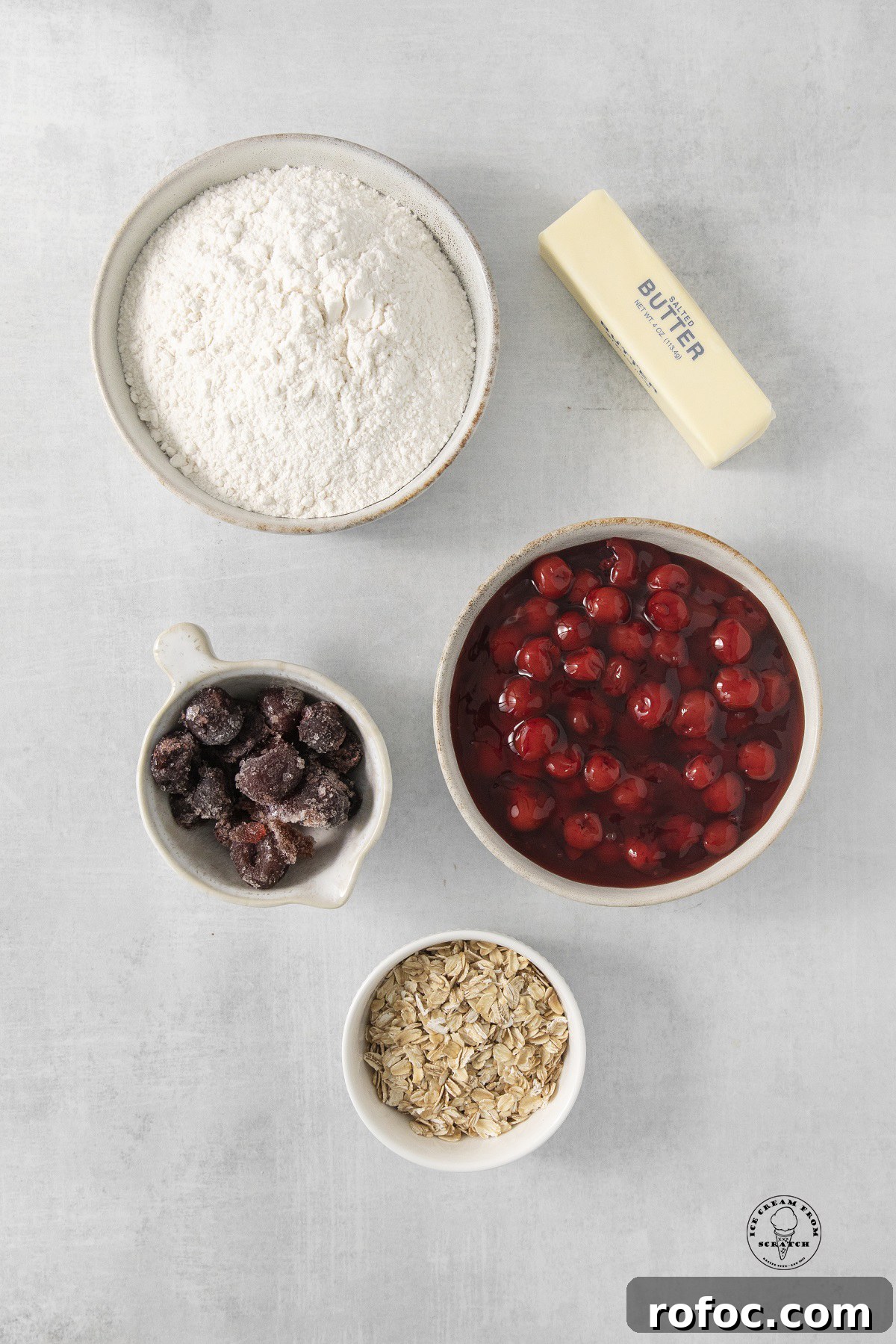 Cherry Cobbler Made with Cake Mix: Quick Cherry Dessert Recipe 3 the ingredients needed to make cherry cobbler with cake mix, oats, frozen cherries, and cherry pie filling.