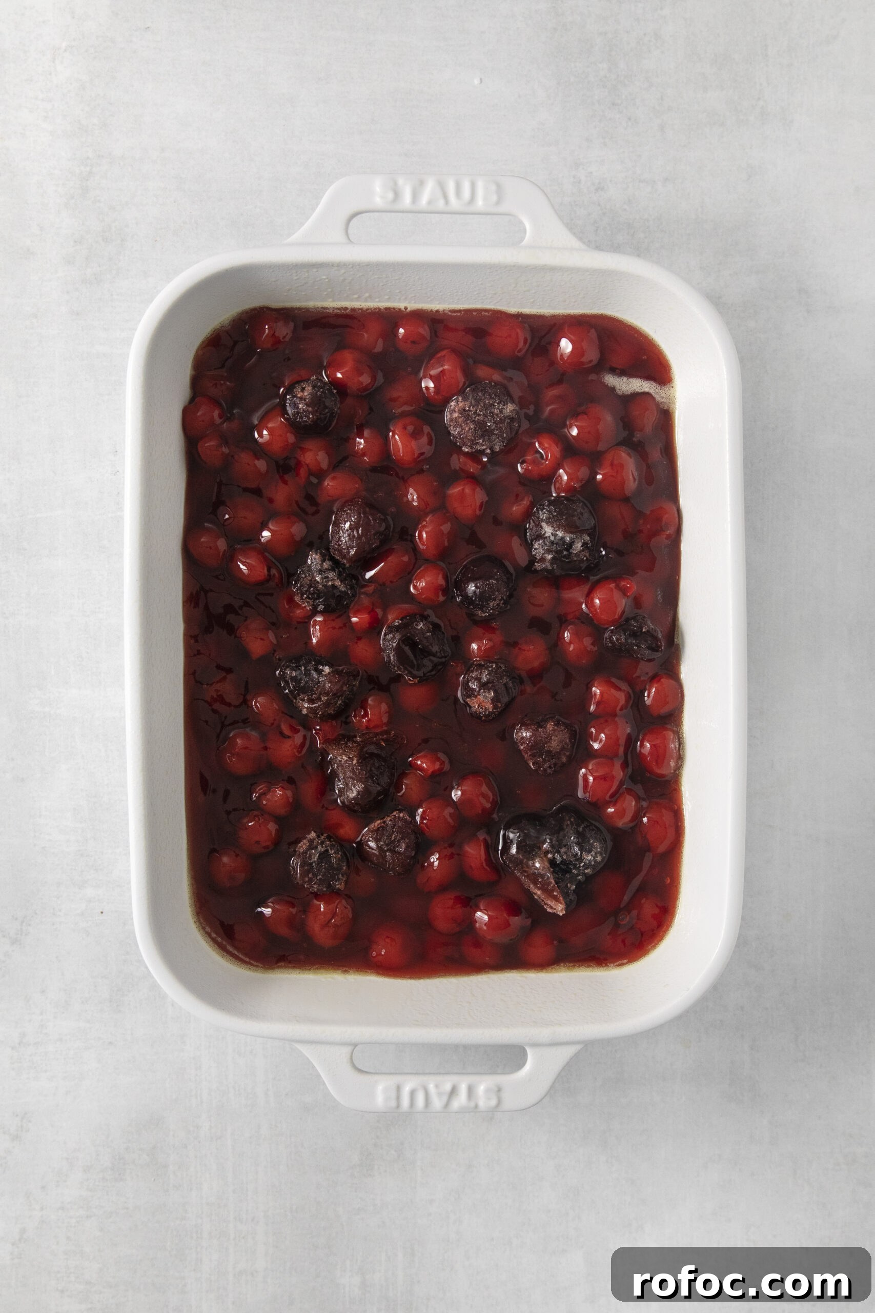 Cherry Cobbler Made with Cake Mix: Quick Cherry Dessert Recipe 7 cherry pie filling in a white baking dish