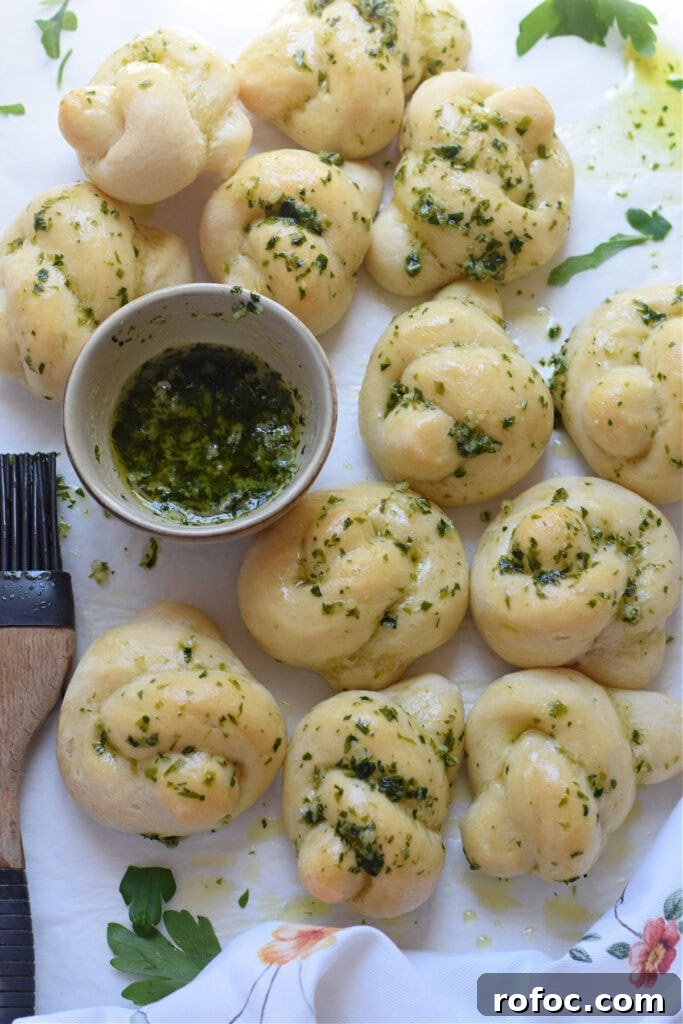 How to Make Homemade Garlic Knots: Soft, Chewy & Flavorful 13 Garlic knots brushed with garlic butter.